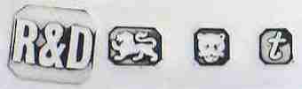 R & D into a chamfered rectangle mark, Roberts & Dore (possibly), London 1974