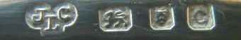 J C above L into a trefoil  mark, not identified, London 1938