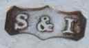 S&I into a shaped cartouche mark, S.Blanckensee & Son trading as Stokes & Ireland, Chester 1928