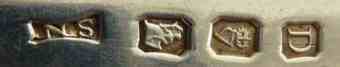 NS into a rectangle with curved sides mark, not identified, Dublin 1945