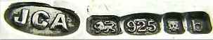 JCA into an oval mark, not identified, London 2001