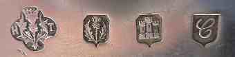 H thistle T into a quatrefoil  mark, Tatton & Son, Edinburgh 1933
