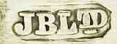 JB Ld into an oblong chamfered rectangle mark, J. Bennett & Co -possibly-, London 1921