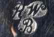 RW over B in script into three circles mark, Harrods Ltd -Richard Woodman Burbridge-, London 1960