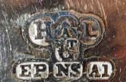 Hamilton, Laidlaw & Company - Glasgow, overstamping another mark (possibly AHT)
