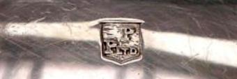 P over PLTd into a shield mark, Poston Products Ltd , Birmingham 1963