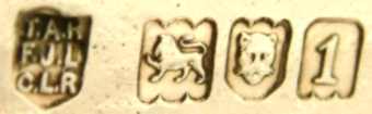T.A.R. over F.J.R. over C.L.R. into a shield  mark, Reid & Sons -Thomas Arthur Reid, Francis James Langford & Christian Leopold Reid-, London London 1906