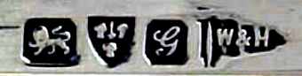 W&H into a flag mark, Walker & Hall, Chester 1907 W&H into a flag mark, Walker & Hall, Chester 1907