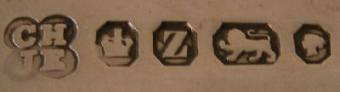 CH over JE into a quatrefoil mark, Hawksworth, Eyre & Co -Charles Hawksworth & John Eyre-, Sheffield 1892