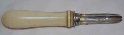 silver and ivory apple corer