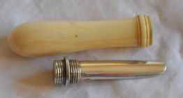 silver and ivory apple corer
