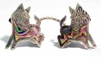 figural sterling silver baby bib holder