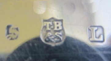 Thomas Bradbury & Sons silverplate mark, date 1913, L into a square