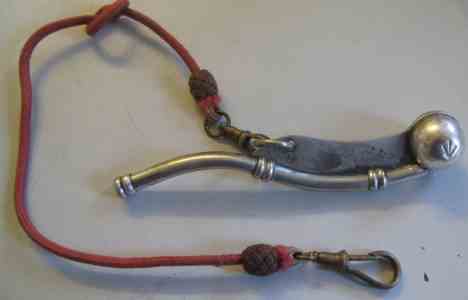 broad arrow on a bosun whistle