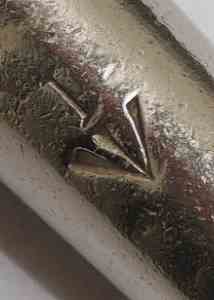 broad arrow on a whistle