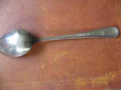 broad arrow on a silverplate spoon