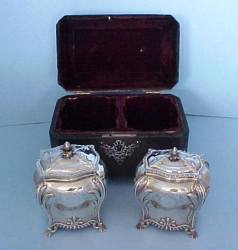 tea-chest and two tea caddies