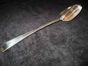 slotted strainer serving spoon: Chawner & Co, London 1860