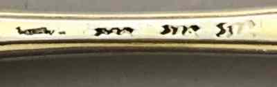 hallmarks on silver spoon with family crest: ASHBURNHAM
