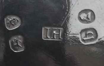hallmark on sterling silver handled bowl with family crest: CONOLLY