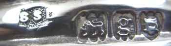 mark of Samuel Smith & Son Ltd, London 1902 on a silver jug cover with Dillon family crest