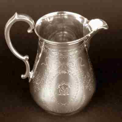 milk jug hallmarked London, 1863, by Thomas Smily