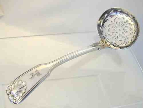 silver plate sugar sifter spoon marked with the maker's mark of Gilbert