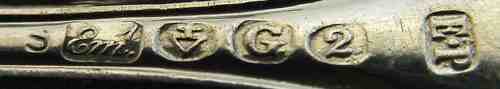 silver plate sugar sifter spoon marked with the maker's mark of Gilbert