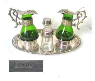 Silver plate cruet set made by Eberle