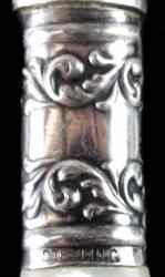 sterling silver ferrule on knife with mother-of-pearl handle