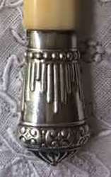 silverplate cap on knife with ivorine handle