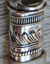 silverplate ferrule on spoon with mother-of-pearl handle