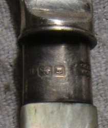 sterling silver ferrule on knife with mother-of-pearl handle