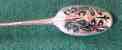 strainer spoon by William Lutwick struck with his mark and the lions head erased