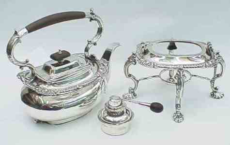 silver teapot on stand: John Round & Sons 1905
