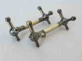 silver and ivory knife rest