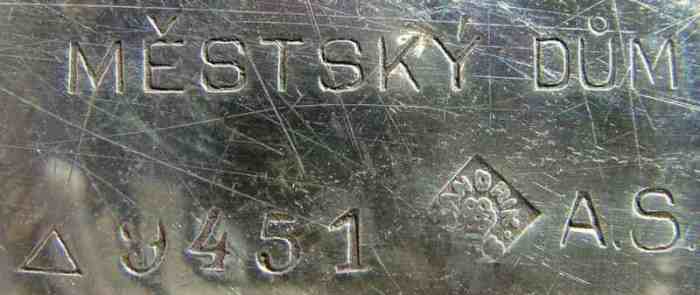 inscription in Czech 'MESTSKÝ DUM' and low-quality Sandrik silver-plating mark, set inside the rhomb inscription in Czech 'MESTSKÝ DUM' and low-quality Sandrik silver-plating mark, set inside the rhomb