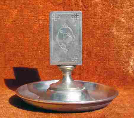 An ash-tray with a match stand made by BMF from pure nickel silver  between 1880 and 1887