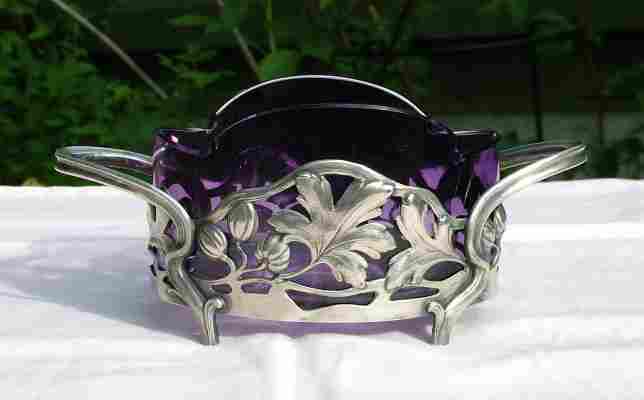 An Art-Nouveau sugar bowl with inlet made of Bohemian glass, issued by BMF Arthur Krupp between 1900 and 1914