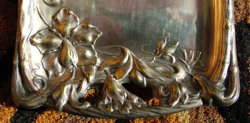 Fragment of Art Nouveau silver-plated tray made of nickel silver in 1903