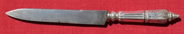 A silver-plated bread knife made in Russian style