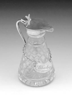 whisky noggin with silver collar and lid
