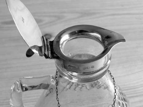 whisky noggin with silver collar and lid