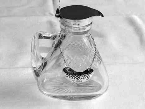 whisky noggin with silver collar and lid