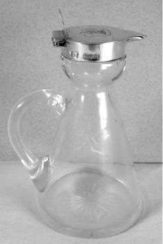 whisky noggin with silver collar and lid