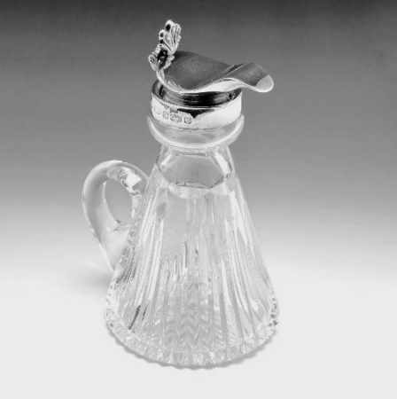 whisky noggin with silver collar and lid