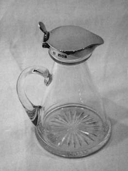 whisky noggin with silver collar and lid