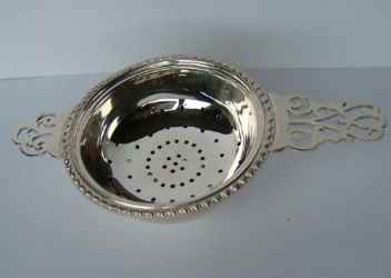 openwork silver tea strainer, saw cutting technique, Birmingham 1900