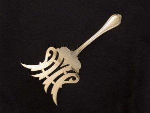 silver asparagus server: fork