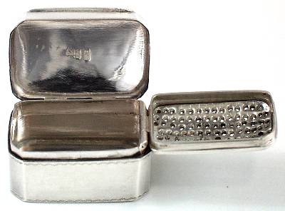 nutmeg grater with inner grate attached to the cover nutmeg grater with inner grate attached to the cover